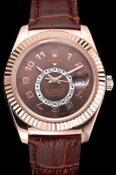 rolex with brown face